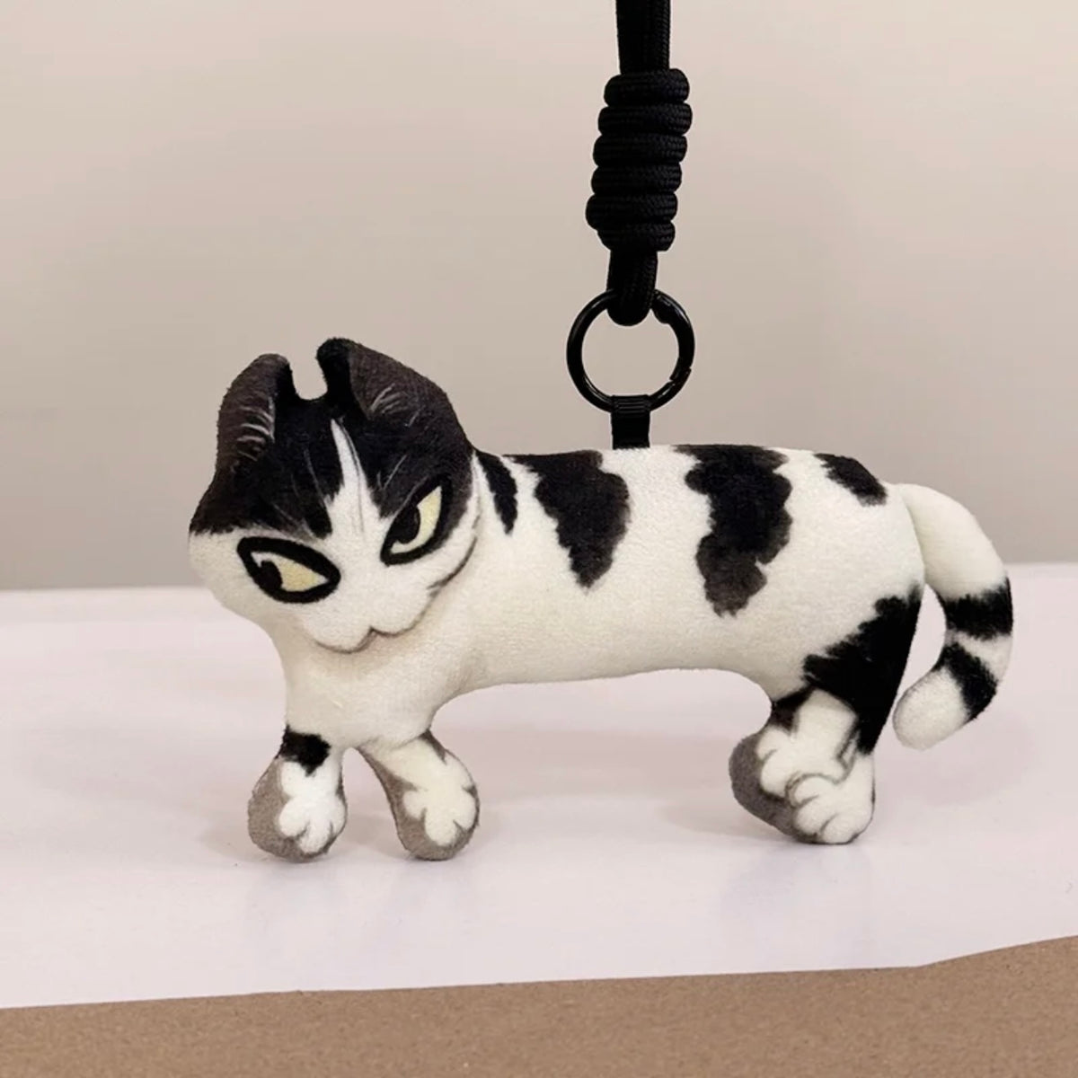 Last Warning Okay Cat — Lounging Plush & Bag Charm